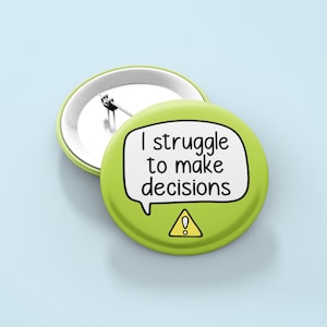May include: Green button with a speech bubble that says "I struggle to make decisions" and a yellow warning sign with an exclamation point.