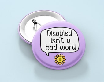 May include: Purple button badge with a speech bubble that says "Disabled isn't a bad word" and a yellow smiley face flower.