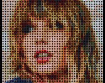 May include: A close-up portrait of a person with brown hair, wearing a blue shirt. The image is made up of small, colourful circles.