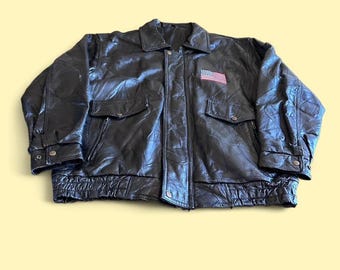 Chaqueta bomber de cuero estilo patchwork vintage, negra, desgastada, talla L para hombre.