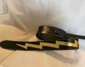 Black leather with gold lighting bolt Guitar Strap