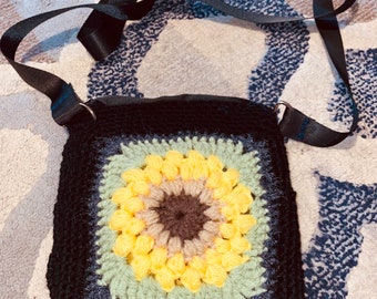 Crocheted granny square bag