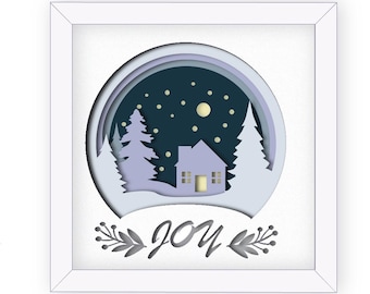 Modèle de boîte d'ombre de cabine d'hiver confortable. 7 couches conçues dans un format de cadre 10 x 10, rétroéclairé par de belles étoiles et la lune.