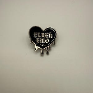 May include: A rustic wooden sign with the text "Welcome to our home" in white lettering. The sign has a distressed finish and a simple, inviting design, ideal for front door decor.