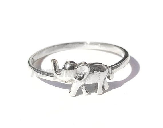 Girls hand with elephant ring - a Royalty Free Stock Photo from Photocase