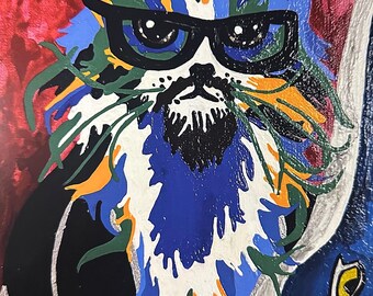 May include: A colorful painting of a cat wearing sunglasses. The cat has a blue, green, white, and orange fur pattern. The cat's eyes are blue and the sunglasses are black. The background is a red and blue abstract design.