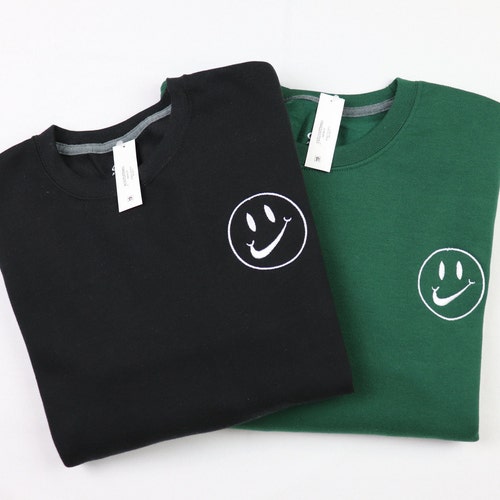 nike smiley face logo