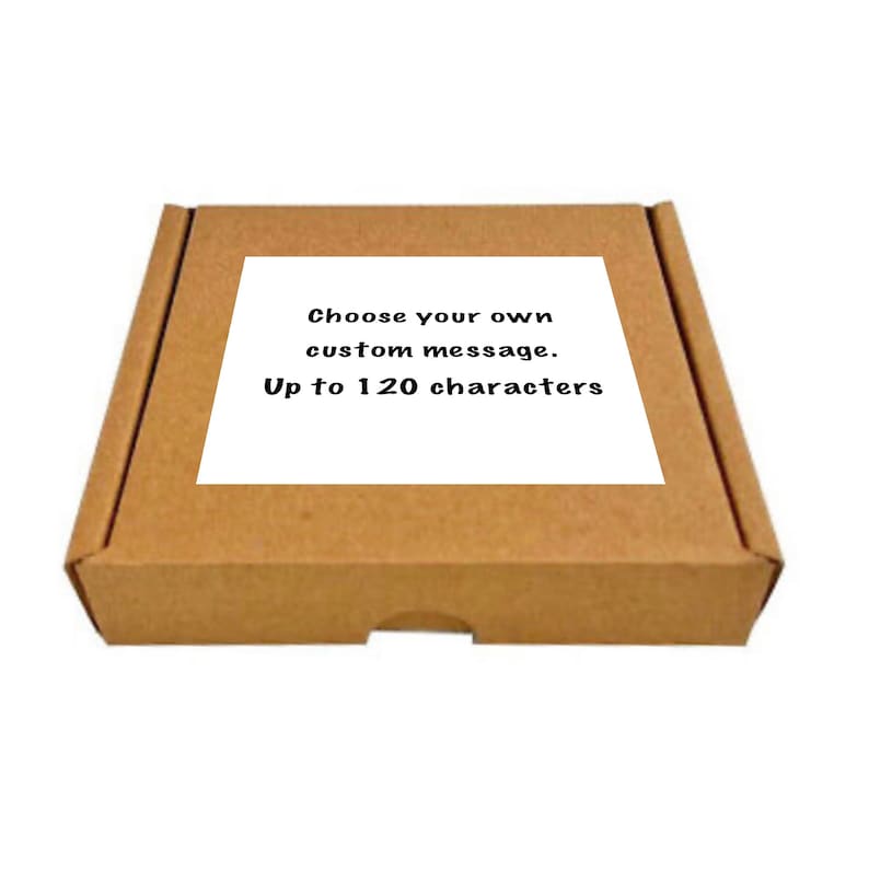 May include: A brown cardboard box with a white label that says "Choose your own custom message. Up to 120 characters."