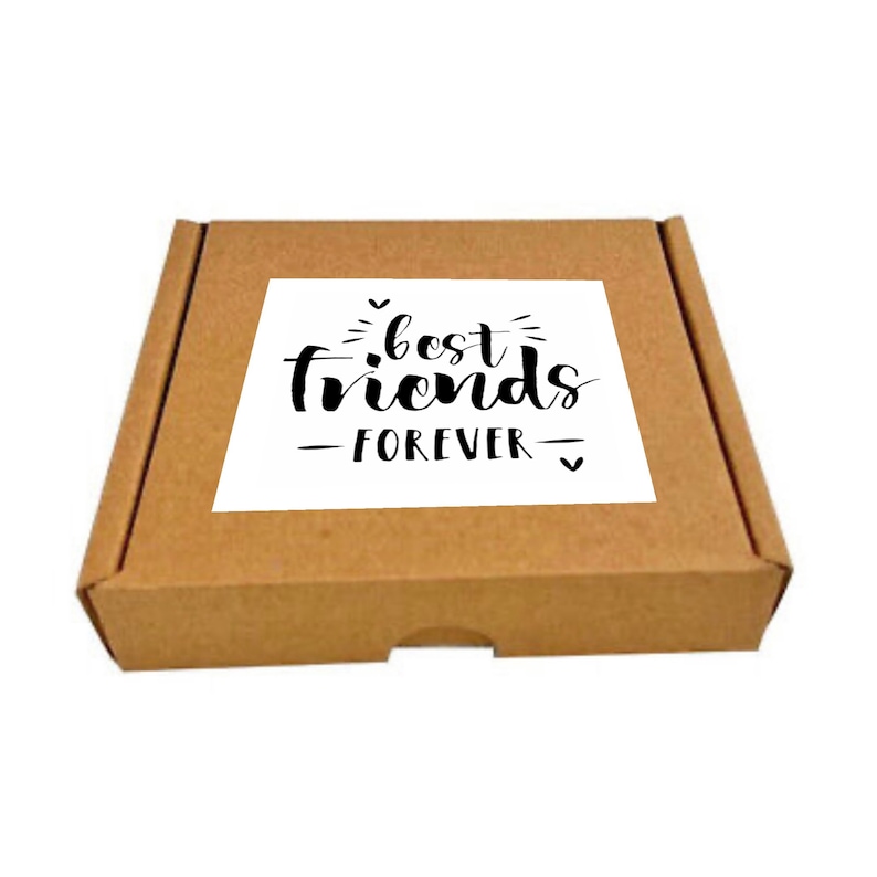 May include: A brown cardboard box with a white label that says "best friends - forever" in black cursive lettering.