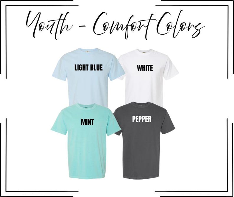May include: Four short-sleeved t-shirts arranged in a grid, labeled Youth - Comfort Colors. The shirts are light blue, white, mint, and pepper gray. Each shirt features its respective color name printed in bold black or white text across the chest.