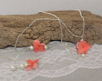Bijoux de dos nu, fleurs stabilisées et perles, hortensia corail, LISA, bijoux mariage bohème, mariage champêtre, mariage romantique.