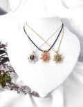 Sun Necklace, Wire Wrapped Crystal Necklace, Gold Stainless Steel Necklace, Black Cord Necklace product logo