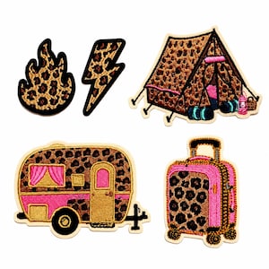 May include: A set of four embroidered patches featuring a leopard print pattern. The designs include a flame, a lightning bolt, a tent with a pink lantern, a vintage-style camper with pink accents, and a rolling suitcase with pink trim.