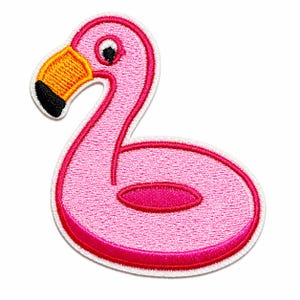 May include: An embroidered patch shaped like a pink flamingo pool float. The flamingo has a bright pink body, a long neck, and a head with a yellow beak tipped in black. The patch features a white border and a textured, stitched surface finish.