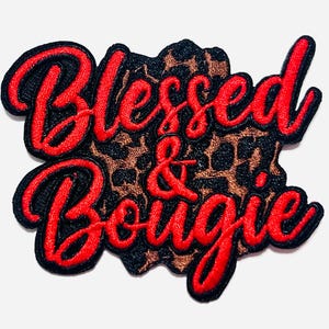 May include: Embroidered patch with the words "Blessed & Bougie" in red script. The text is outlined in black and sits atop a leopard print background. The patch measures approximately 2 inches in height.