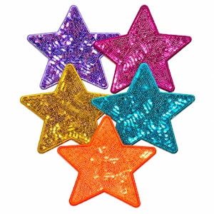 May include: A collection of five star-shaped patches covered in shimmering sequins. The set includes one purple, one hot pink, one gold, one turquoise, and one bright orange star, each featuring a solid color border and a reflective surface.