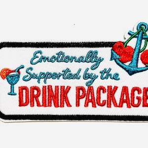 May include: Embroidered patch with the text "Emotionally Supported by the DRINK PACKAGE". The patch features a cocktail, anchor with cherries, and a black border on a white background.