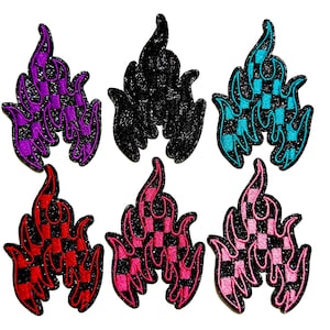 May include: A white ceramic mug with a black handle and the text "But First, Coffee" in a handwritten style. The mug is likely for hot beverages and has a glossy finish.