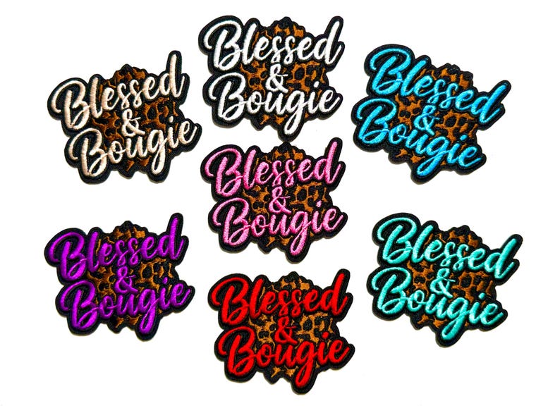 May include: Embroidered patches with the text "Blessed & Bougie" in various colors, including white, blue, purple, pink, red, and teal. The background of each patch features a leopard print design.
