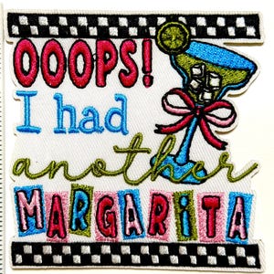 May include: Embroidered patch with the text "OOOPS! I had another MARGARITA" in red, blue, and green. The patch features a margarita glass with a lime and a pink bow. The patch is approximately 3 inches wide.