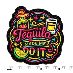 May include: Embroidered patch with a black background featuring a tequila bottle, shot glass, and lime wedge. The patch reads "Tequila Made Me Do It" in colorful lettering. The design includes yellow, pink, blue, and green accents.