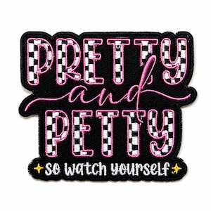 May include: A black embroidered patch featuring the text PRETTY and PETTY in a white and black checkered pattern with a pink outline. Below, the text so watch yourself is embroidered in white with two small yellow four-pointed star icons.