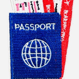 May include: Embroidered patch featuring a blue passport with a white globe design and the word "PASSPORT". Two red boarding passes are behind the passport. The patch has a white background and a ruler in inches.