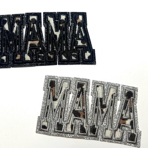 May include: Two "MAMA" patches. One set has black glitter borders with a leopard print pattern inside the letters. The other set has silver glitter borders with a leopard print pattern inside the letters. Both sets are on a white background.