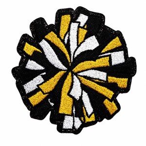 May include: An embroidered patch in the shape of a cheerleader pom-pom. The design features a radial pattern of individual strands in alternating colors of black, bright yellow, and white, with a thick black border outlining the entire shape.