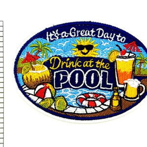 May include: Embroidered patch with the text "It's a Great Day to Drink at the POOL". The patch features a sunny sky, palm trees, and tropical drinks. A coconut drink, a cocktail, and a beer are shown.