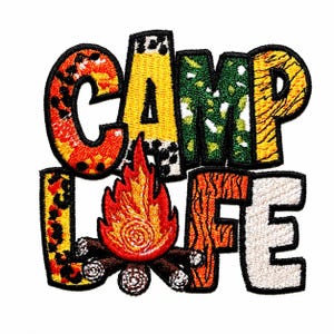 May include: An embroidered patch featuring the text CAMP LIFE in bold, block letters. Each letter displays a unique pattern including leopard print, yellow, green camouflage, tiger stripes, and wood grain. A bright orange and red campfire sits below.