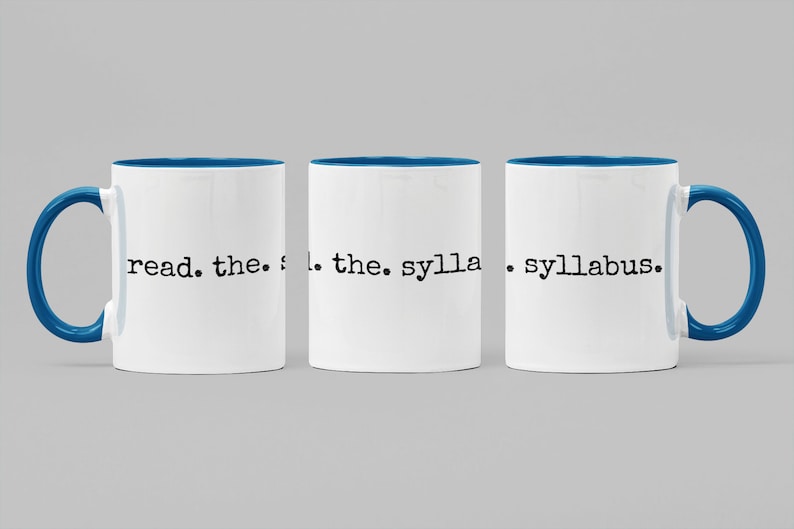 May include: Three white coffee mugs with a blue rim and handle. The mugs have the text "read. the. syllabus." printed on them.