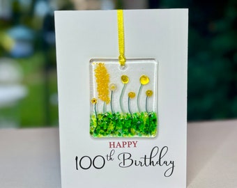 Tarjeta de feliz cumpleaños número 100 con recuerdo floral de vidrio fundido desmontable.