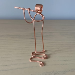 Joueur de flûte - sculpture en cuivre
