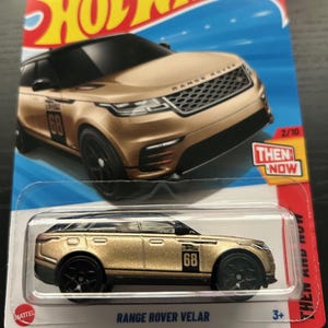 Hot Wheels Miniatur-Range-Rover-Velar-Gold mit schwarzen Rädern, lange Karte, schwer zu finden, Sammler-Miniatur-Modell 1/64