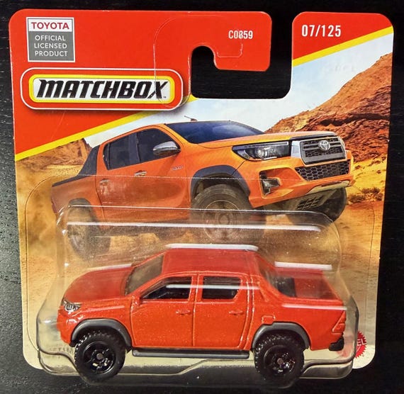 Matchbox 2018 Toyota Hilux Pickup-orange With Black Wheels-short