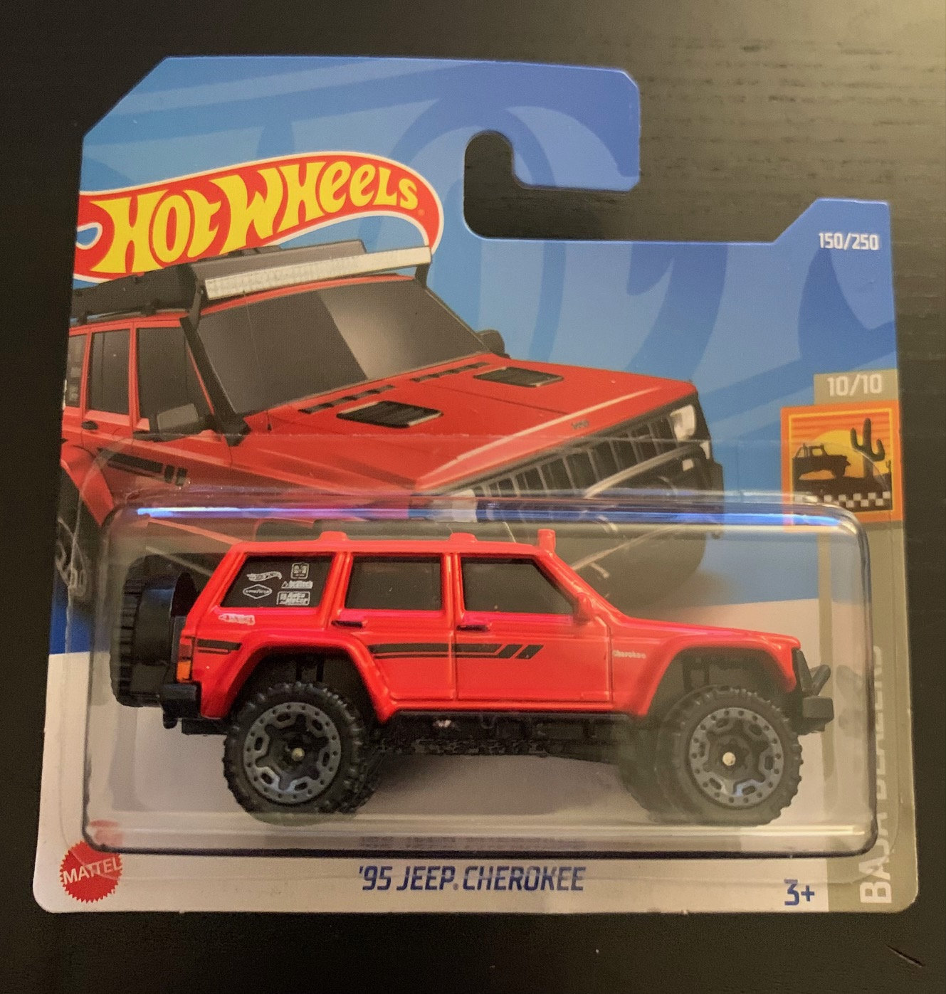 Hot Wheels 1995 Jeep Cherokee red With Black Roof Rack short Card