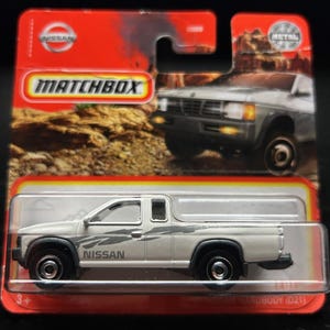Matchbox 1995 Nissan Hardbody-White With Black Interior-Short Card -Hard to Find Collector Miniature Model 1/64