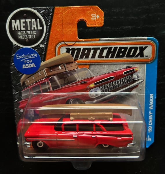 Matchbox 1959 Chevy Wagon- Red With Canoe on Roof-short Card -hard