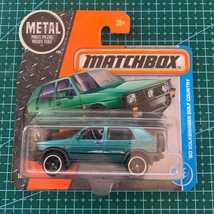 Matchbox 1990 Volkswagen Golf Country - Azul claro con interior negro - Tarjeta corta - Modelo en miniatura de coleccionista difícil de encontrar 1/64