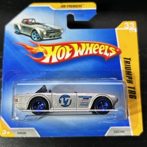 Hot Wheels Triumph TR6-Silber mit blauen Rädern-2009 Kurze Karte- schwer zu finden Sammler Miniatur Modell 1/64