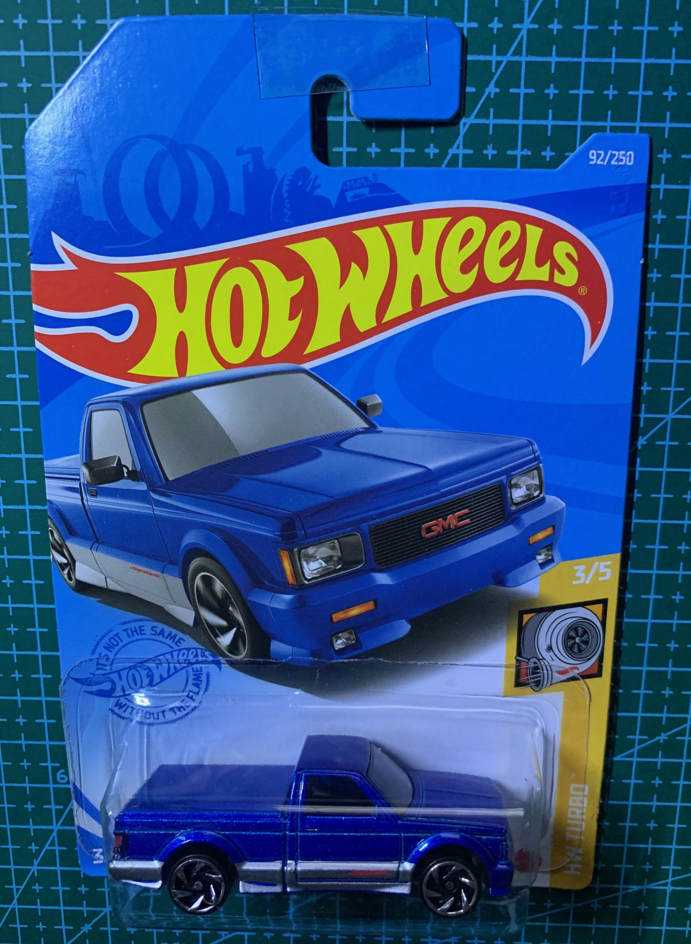Johnny Lightning 1:64 GMC Syclone 1991 - Rosso Brillante, Modello JLSP027