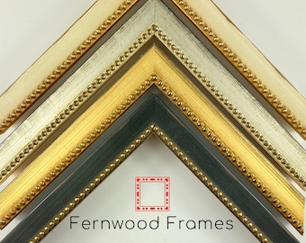 May include: Four picture frames with ornate gold beading. The frames are in different colors: white, silver, gold, and black. The frames are arranged in a pyramid shape. The text "Fernwood Frames" is at the bottom of the image.