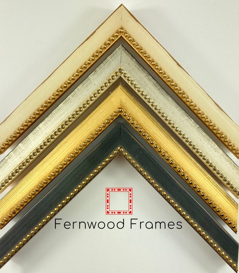 May include: Four picture frames with ornate gold beading. The frames are in different colours: white, silver, gold, and black. The frames are arranged in a pyramid shape. The text "Fernwood Frames" is at the bottom of the image.