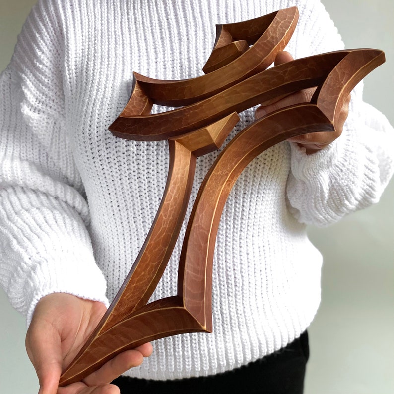 unique wooden carved cross for home decor. Religious gift ideas for church.