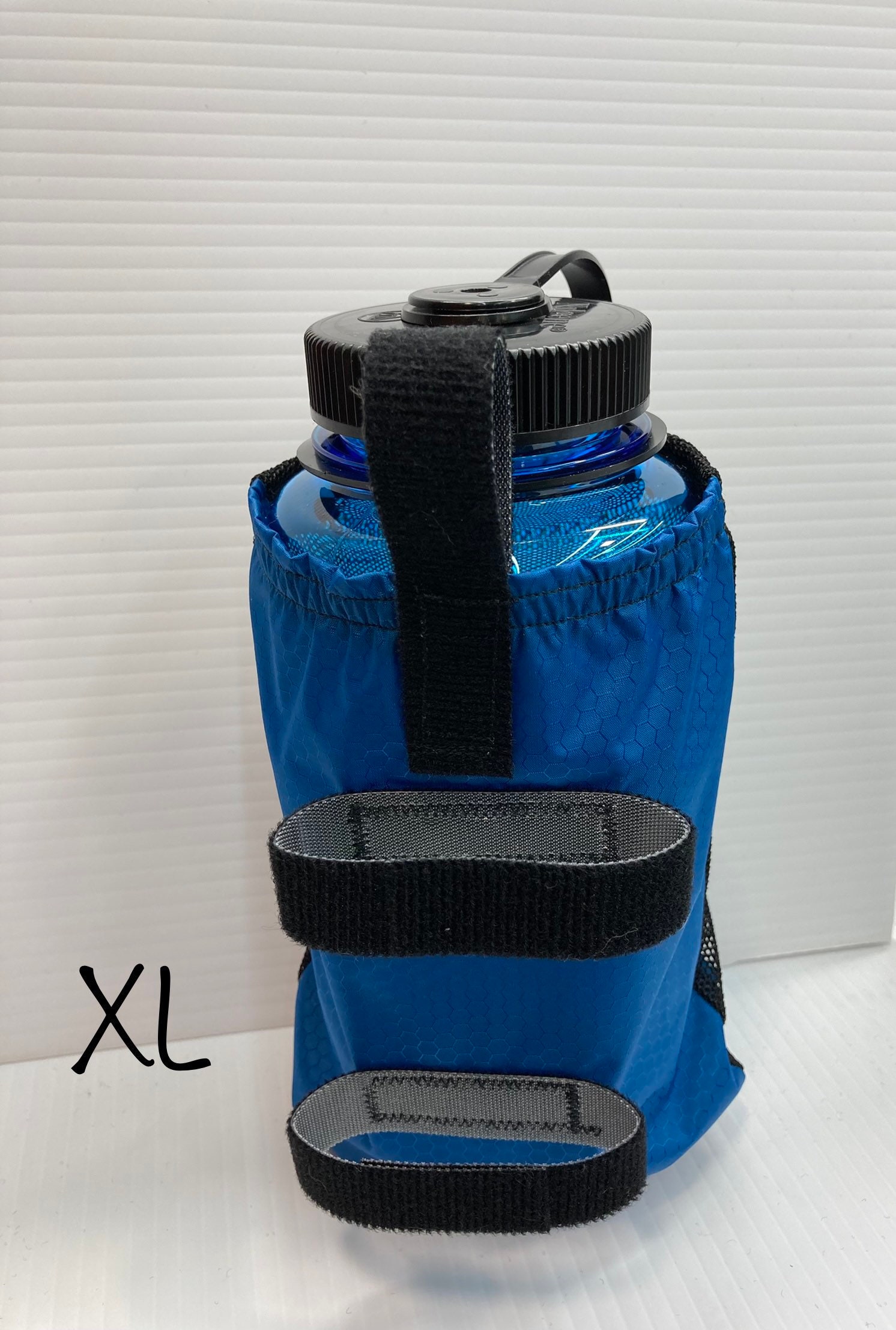 Elastic Top Water Bottle Holder for a Backpack 