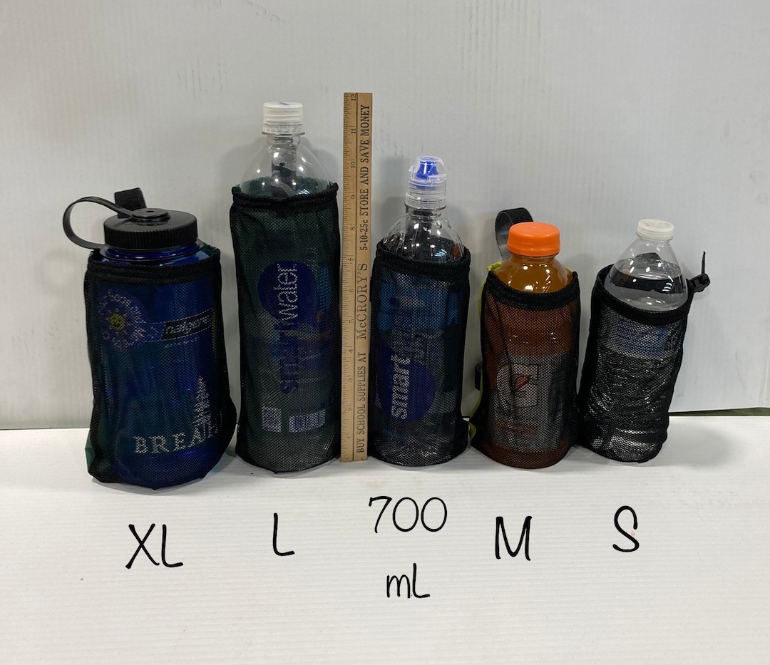 Clip on water clearance bottle holder for backpack