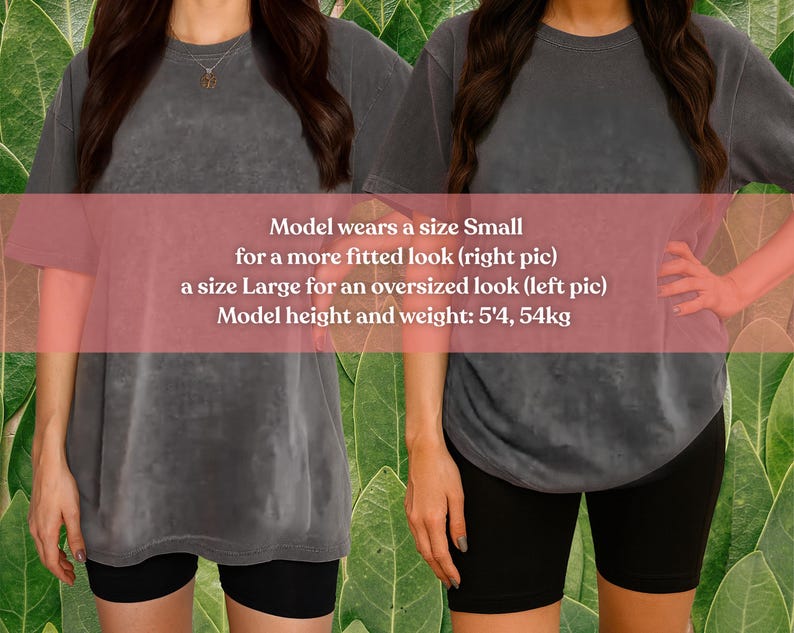 May include: Two women wearing gray t-shirts and black shorts. The text on the image says the model wears a size Small for a fitted look and a size Large for an oversized look. The model's height is 5'4 and weighs 54kg.