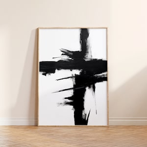 May include: Black and white abstract painting with bold brushstrokes in a wooden frame.
