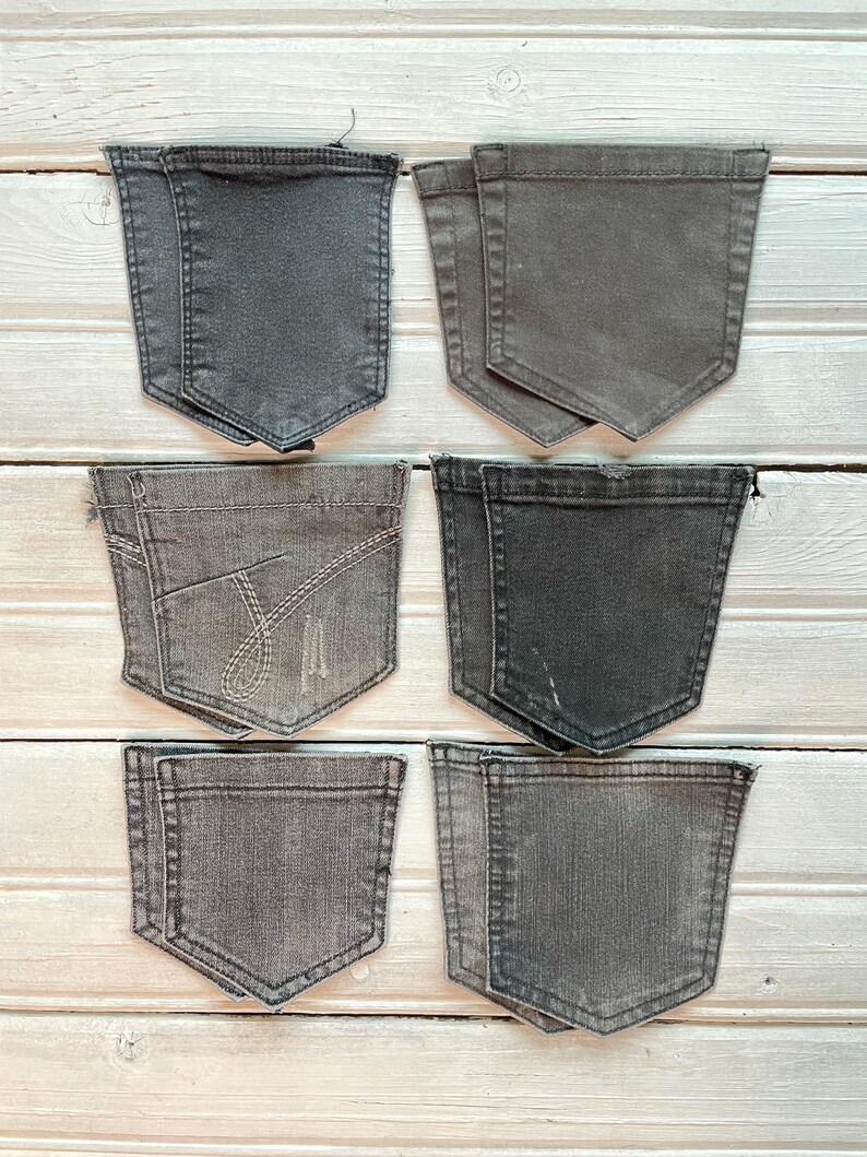 Each pocket has a vintage look with natural wear, subtle fading, and original stitching details.